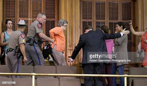 Elderly Woman Arrested Photos And Premium High Res Pictures Getty Images
