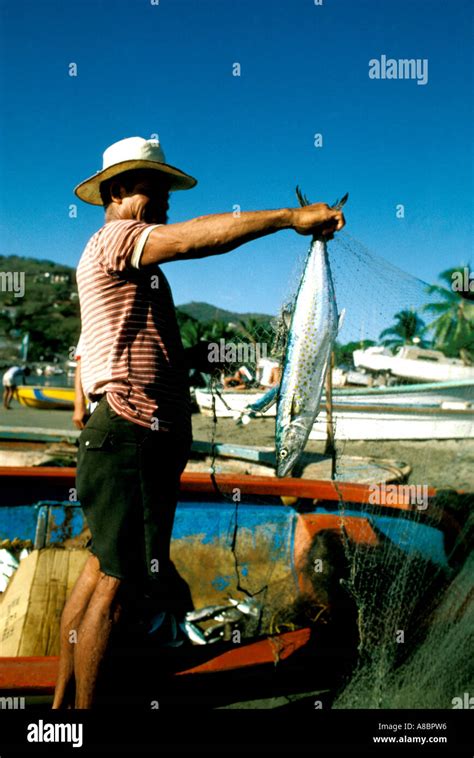 Mexico Fisherman At Zijuatanejo Stock Photo Alamy