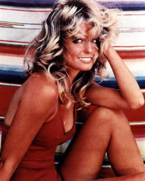 The Story Behind The Iconic Farrah Fawcett Red Swimsuit Poster That