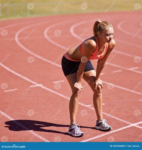Ready For A Race Shot Of An Attractive Young Runner Out On The Track Stock Image Image Of