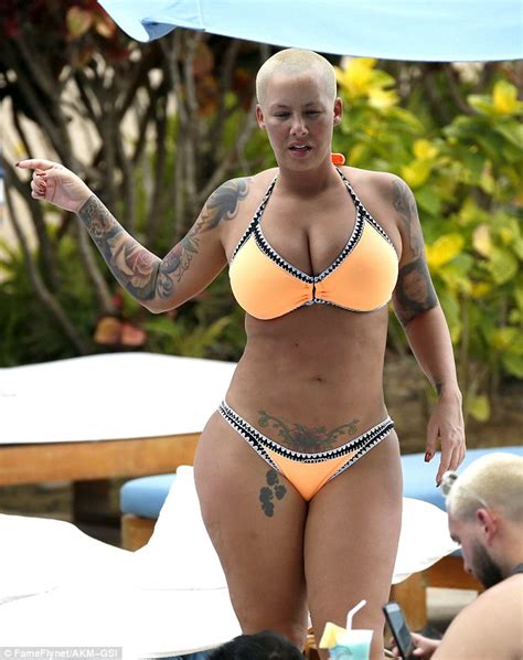 Hot Sexy Amber Rose Puts Her Curvaceous Figure On Display In Tiny Bikini Photos
