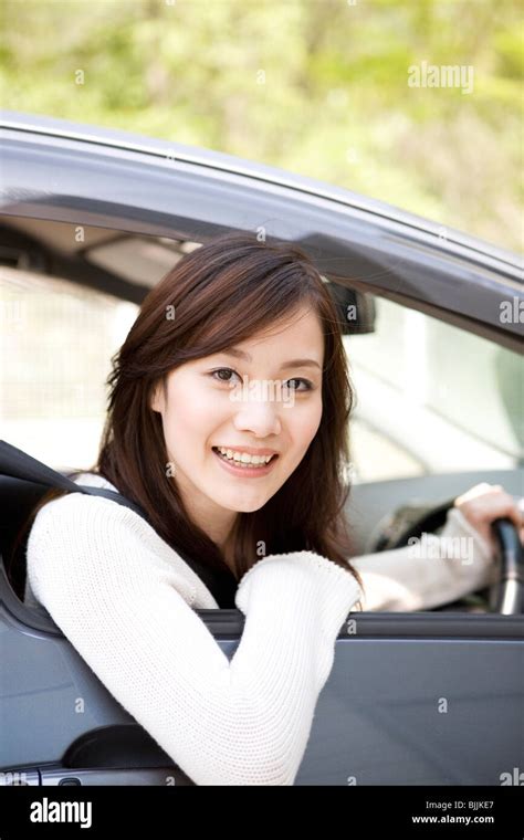 Young Woman Sitting In Car Stock Photo Alamy