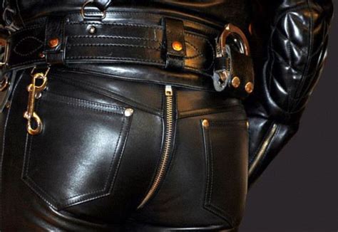 stylish black leather pants with gold buckles