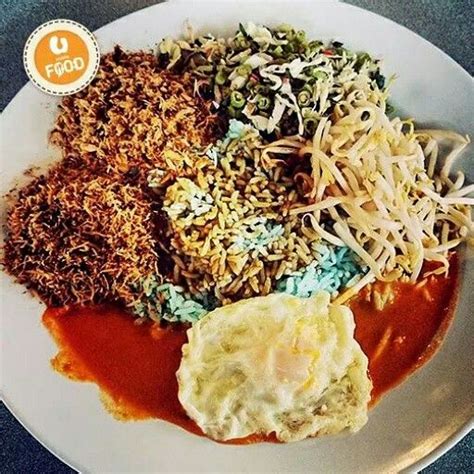 This place serves nasi kerabu throughout the day until 4am! Nasi Kerabu tastes best with loads of veggies, kuah and ...