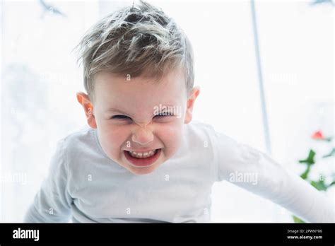 Close Up Of Little Boy Gritting His Teeth In Anger Stock Photo Alamy
