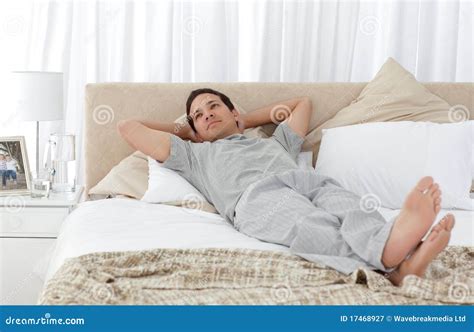 Tranquil Man Lying On His Bed Royalty Free Stock Photography Image