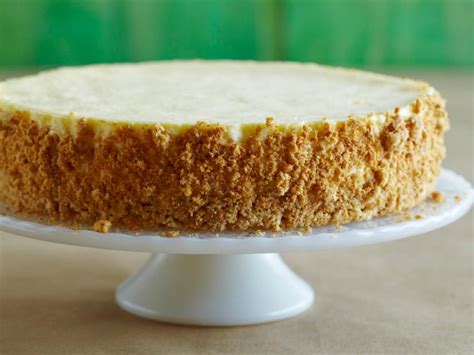 This is our absolute best cheesecake recipe—supremely creamy, rich, and classic. Sour Cream Cheesecake Recipe | Alton Brown | Food Network