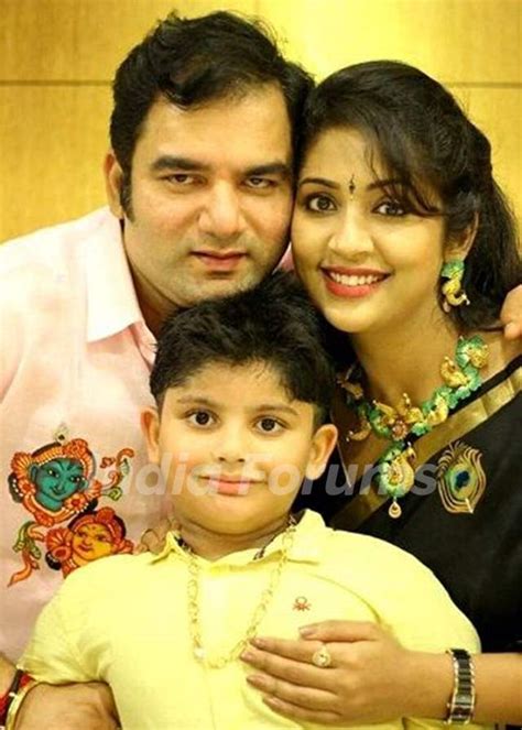 Navya Nair With Her Husband Santhosh Menon And Son Sai Krishna Photo