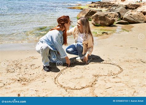 Young Lesbian Couple Of Two Women In Love At The Beach Stock Image Image Of Love People