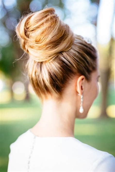 Follow the bun hairstyles step by step, as mentioned above. Bun Hair Model - Big Bun #2042937 - Weddbook