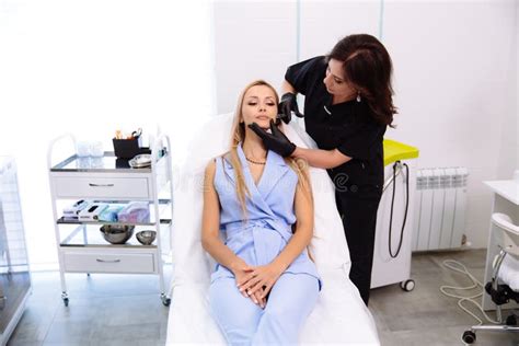 Cosmetologist Doctor Make Facial Beauty Injections To Her Woman Client Beautiful Female Face