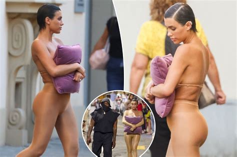 Bianca Censori Hides Her Breasts Behind A Pillow During Italy Stroll