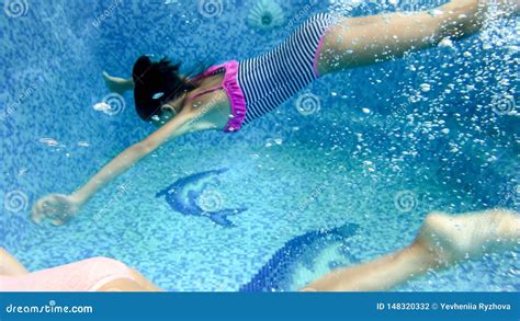 Underwater Image Of Teenage Girl In Striped Swimsuit Diving And 53487 Hot Sex Picture