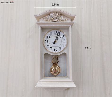 Buy Almirah Design Wall Clock With Pendulum And Hourly Sound White