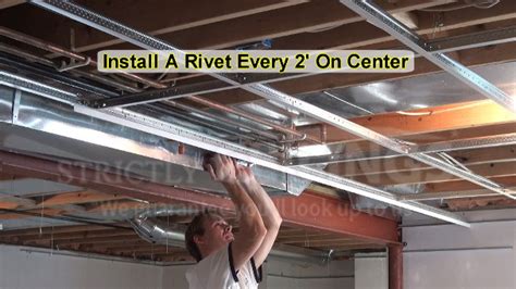 First, put the tile into the grid. Build Basic Suspended Ceiling Drops - Drop Ceilings ...