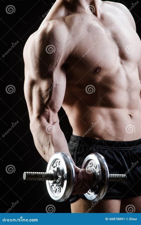 The Muscular Ripped Bodybuilder With Dumbbells Stock Image Image Of Heavy Health 60878891