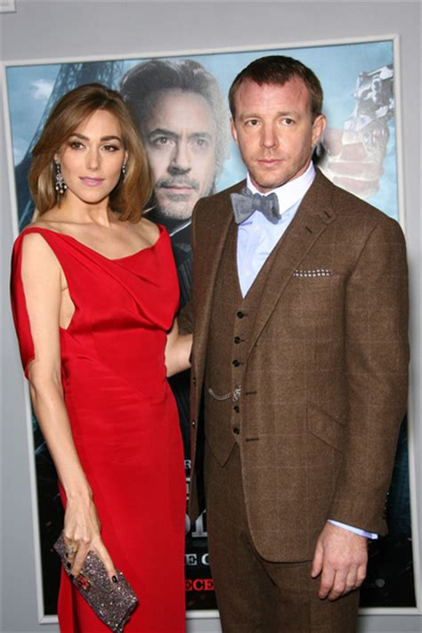 Jacqui Ainsley And Guy Ritchie Pictures Sherlock Holmes A Game Of Shadows Premiere Photos