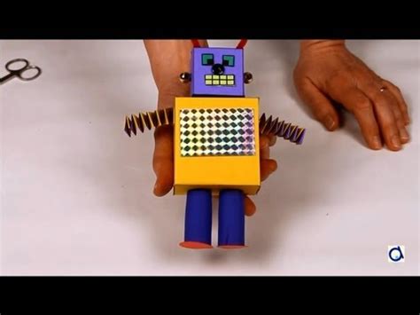 This is a simple robot made out of household materials that can move around on your desk. How to make a paper robot - YouTube
