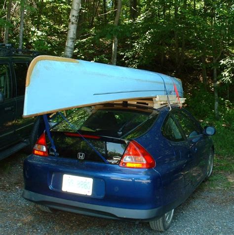 The paint on the roof of the car has faded a great deal. Canoe Roof