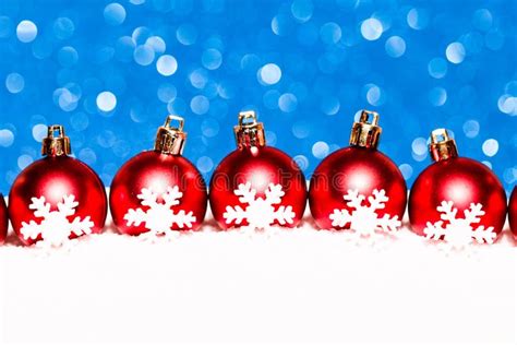 Christmas Red Balls In Snow On Blue Glitter Stock Photo Image Of Pine