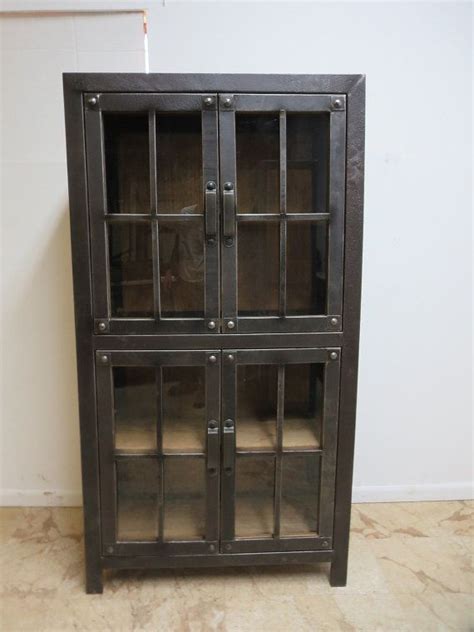Item features steel metal frame, lighted interior, 4 swing doors, 3 drawers, 2 glass shel. Industrial Reclaimed Metal China Curio by ...
