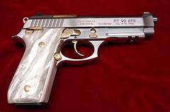 Taurus Pt92 Gold Accents