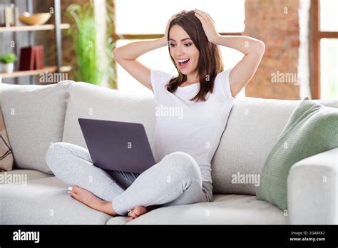 Photo Portrait Brunette Woman Sitting On Couch At Home Working On