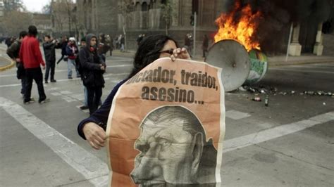 chile march to honour pinochet victims ends in violence bbc news