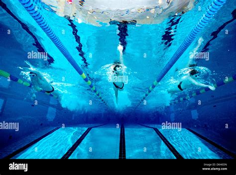 Underwater Photograph Of A Boys High School Swim Team Practicing In An