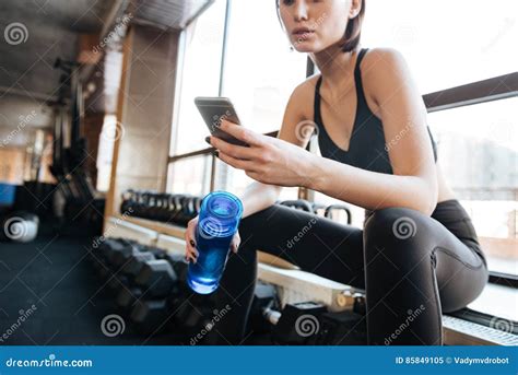 Woman Athlete Using Cell Phone In Gym Stock Image Image Of Cell Person 85849105