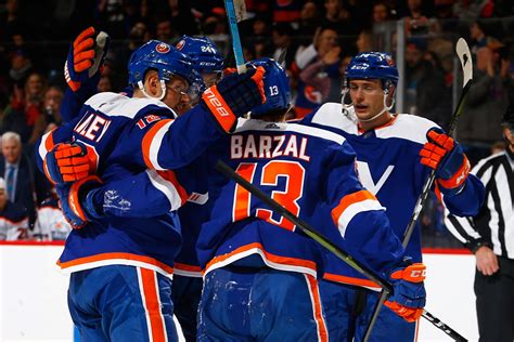 The new york islanders coaching staff attend to bench duties during the game between the new york islanders and the washington capitals at nycb live's nassau. Islanders are picking up right where they left off last season