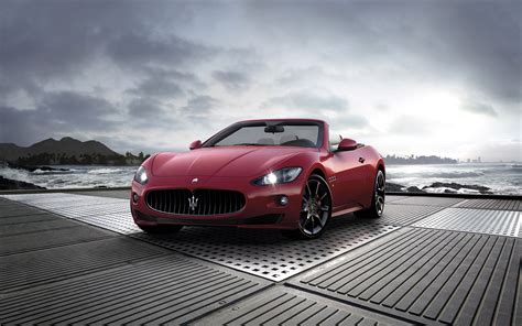 Red Maserati Car Getting A New Drive Started Sprays Are Cheering And