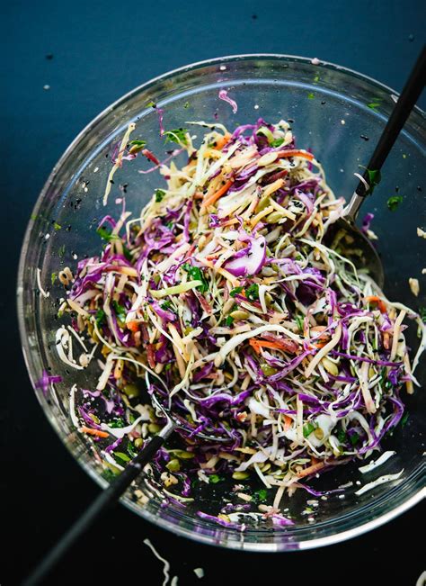 Drizzle the dressing over the slaw and toss until all of the ingredients are lightly coated. 33 Perfect Beach Snacks to Pack All Summer | StyleCaster