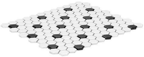 The White And Black Hexagonal Tiles Are Arranged In An Arrangement On