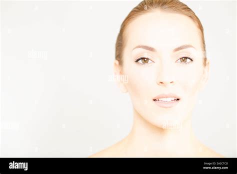 Beautiful Young Womans Face In A Beauty Style Pose Stock Photo Alamy