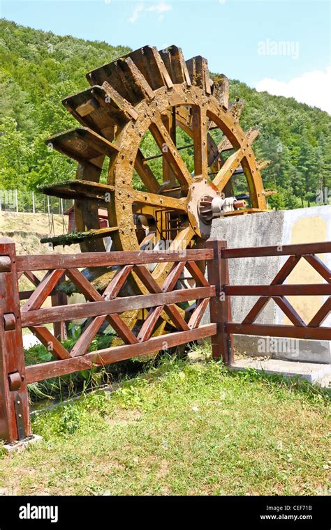 Wooden Wheel Of An Old Water Mill Stock Photo Alamy