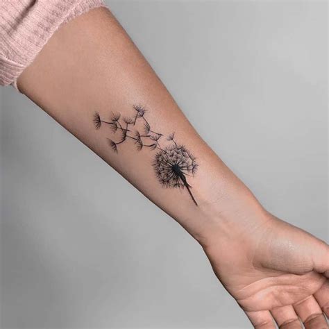 blowing dandelion tattoo designs