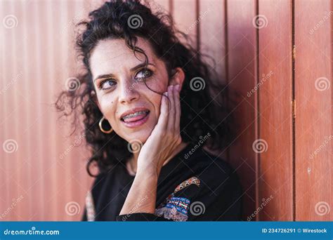 Portrait Of A Spanish Female Posing Near The Wal Stock Image Image Of