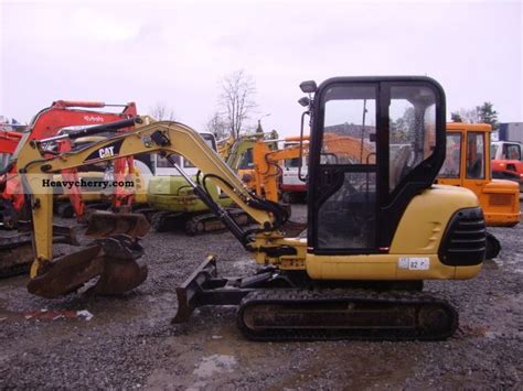 3.692 kg, cat c1.8 diesel motor, leistung 23,6 kw/ 31,6 ps, kabinenschaden links oben vorhanden, ce, max. CAT 303.5 2001 Mini/Kompact-digger Construction Equipment ...