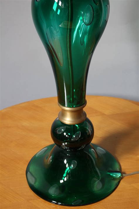 Enjoy amazing optical illusions while simultaneously providing some mind blowing ambient lighting for the room by using this dichroic glass table lamp. Large Original 1970s Hand Blown Glass and Brass Murano ...