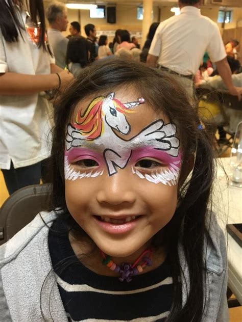 A Unicorn Face Painting Design Done From One Of Our Talented Face