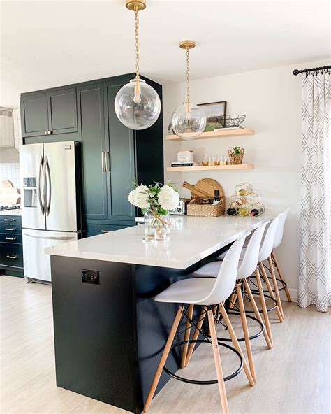 This contemporary farmhouse kitchen manages to find the perfect blend of neutral yet contrasting colors. Black Semihandmade + IKEA kitchen (With images) | Home ...