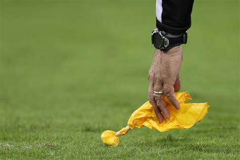 The Real Reason Why Football Referees Throw Yellow Penalty Flags
