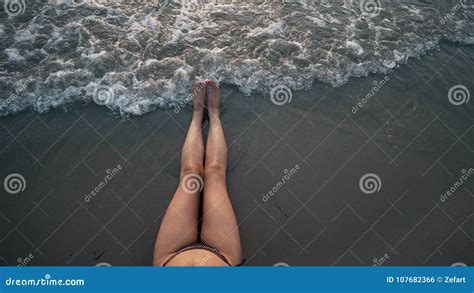 Woman In Bikini Lying On A Beautiful Sandy Beach Stock Photo Image Of