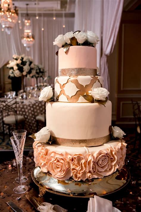 At cakeclicks.com find thousands of cakes categorized into thousands of categories. Intricate Four Tier Wedding Cake in Blush, Gold and Ivory