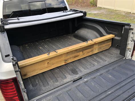 Now cargoglide and bedslide make some really nice products, however i wasn't interested in dropping $1,500 to $2,000. I made this divider a few years back for helping keep ...