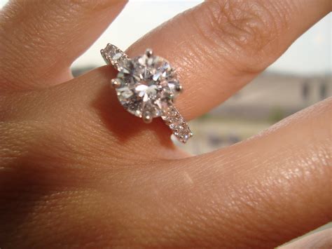 How much to spend and how much a diamond engagement ring should cost? 2 carat cushion cut diamond engagement ring