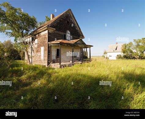 Abandoned Farm House In Rural Field Stock Photo Alamy