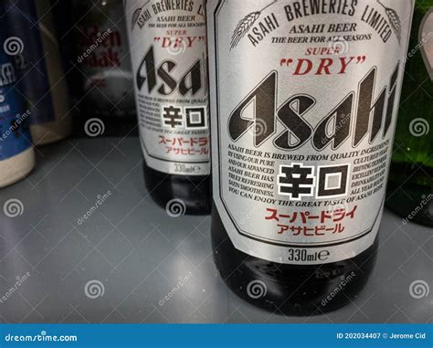 Logo Of Asahi Breweries On Bottles Of Beer For Sale Editorial
