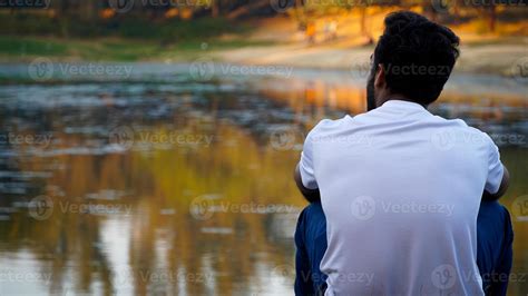 Thinking Man Sitting Alone On Sea Beach Feeling Alone And Sad 5254986